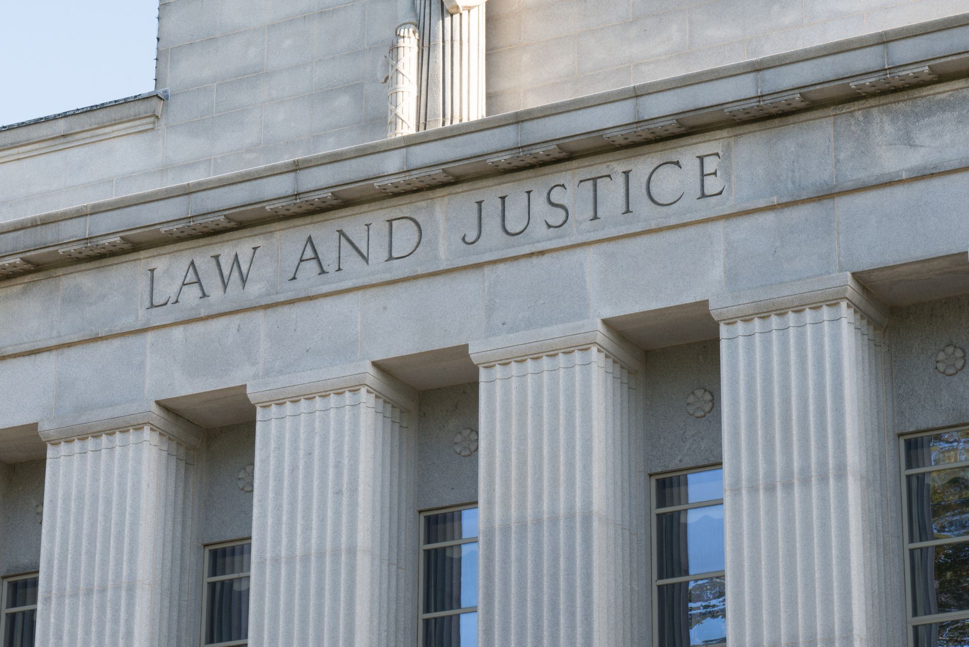A Statue Of Justice Holding Scale — The Law Offices Of Cardaro & Peek, LLC