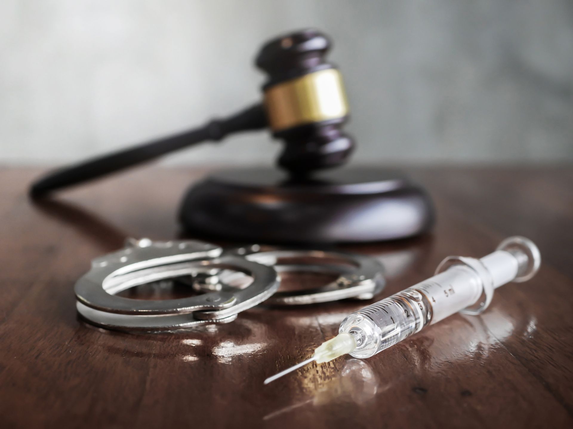 A Gavel, Handcuff, and syringe — The Law Offices Of Cardaro & Peek, LLC A Gavel, Handcuff, and syringe— The Law Offices Of Cardaro & Peek, LLC