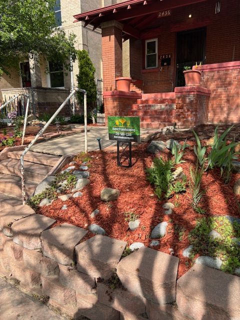 A house with a for sale sign in front of it