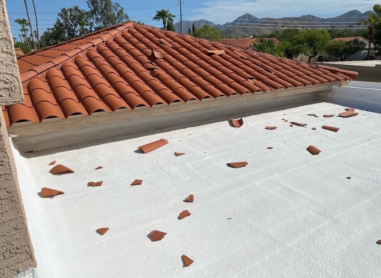 clay roofing tiles blown off a roof