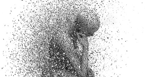 sitting man looking depressed