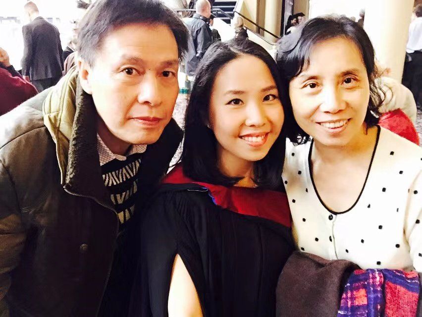 Josie and her parents at her graduation ceremony at Royal Roads University