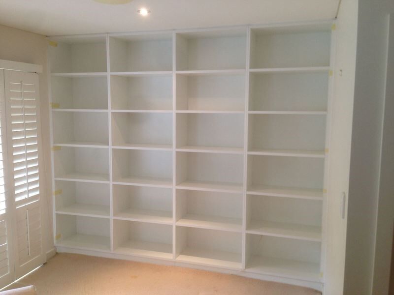 A Room with A Lot of Shelves and A Window — Burns Custom Kitchens in Newcastle, NSW