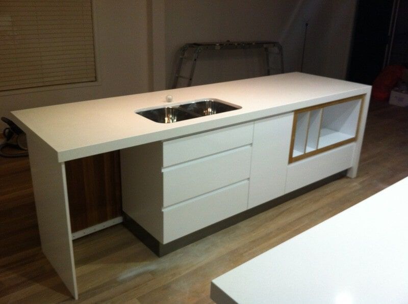 A Kitchen with White Cabinets and A Sink — Burns Custom Kitchens in Newcastle, NSW