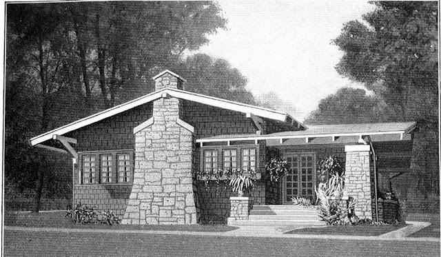 A black and white photo of a house with a stone chimney.