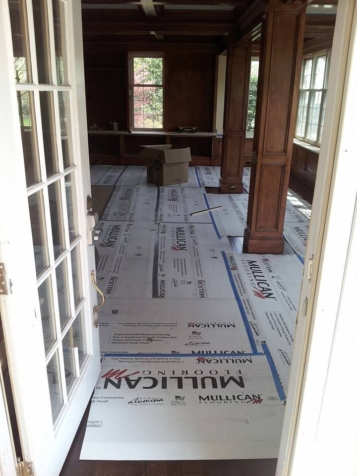 A room with a french door that is covered in mullican foam