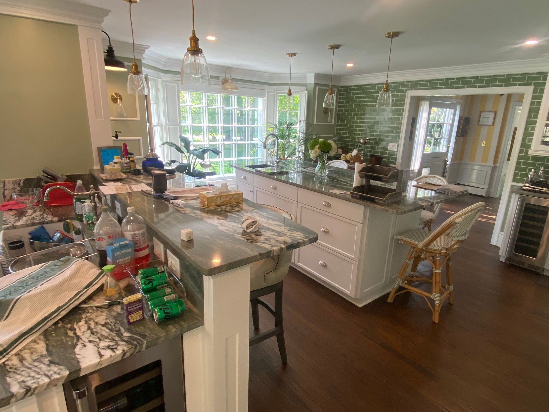 A kitchen with a large island in the middle of the room.