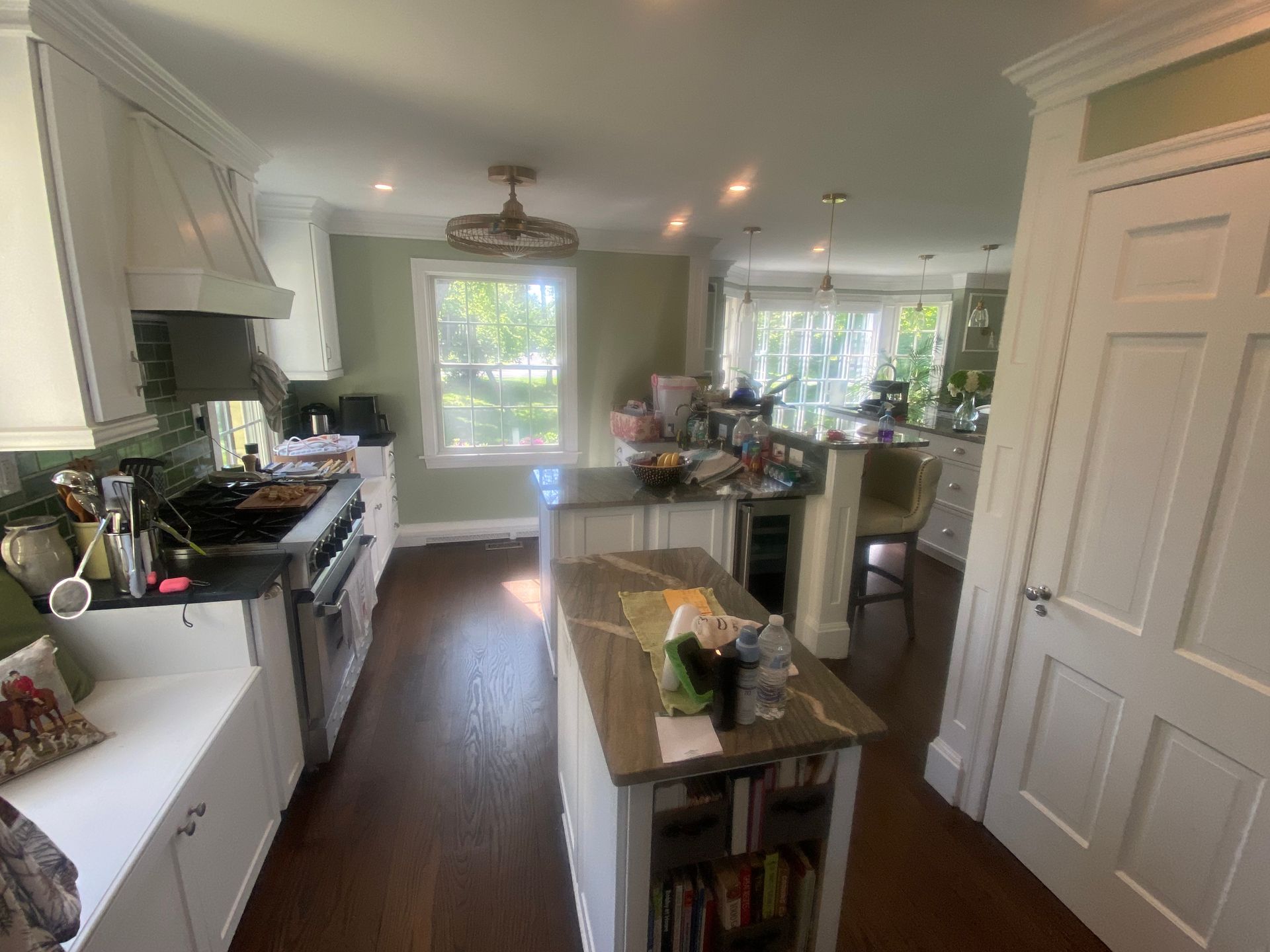 A kitchen with a large island in the middle of it