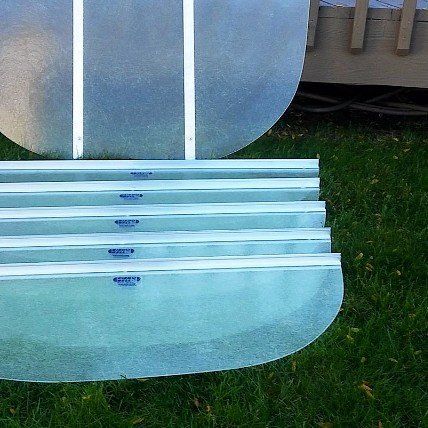 A row of clear aluminum pieces with the word aluminum on them