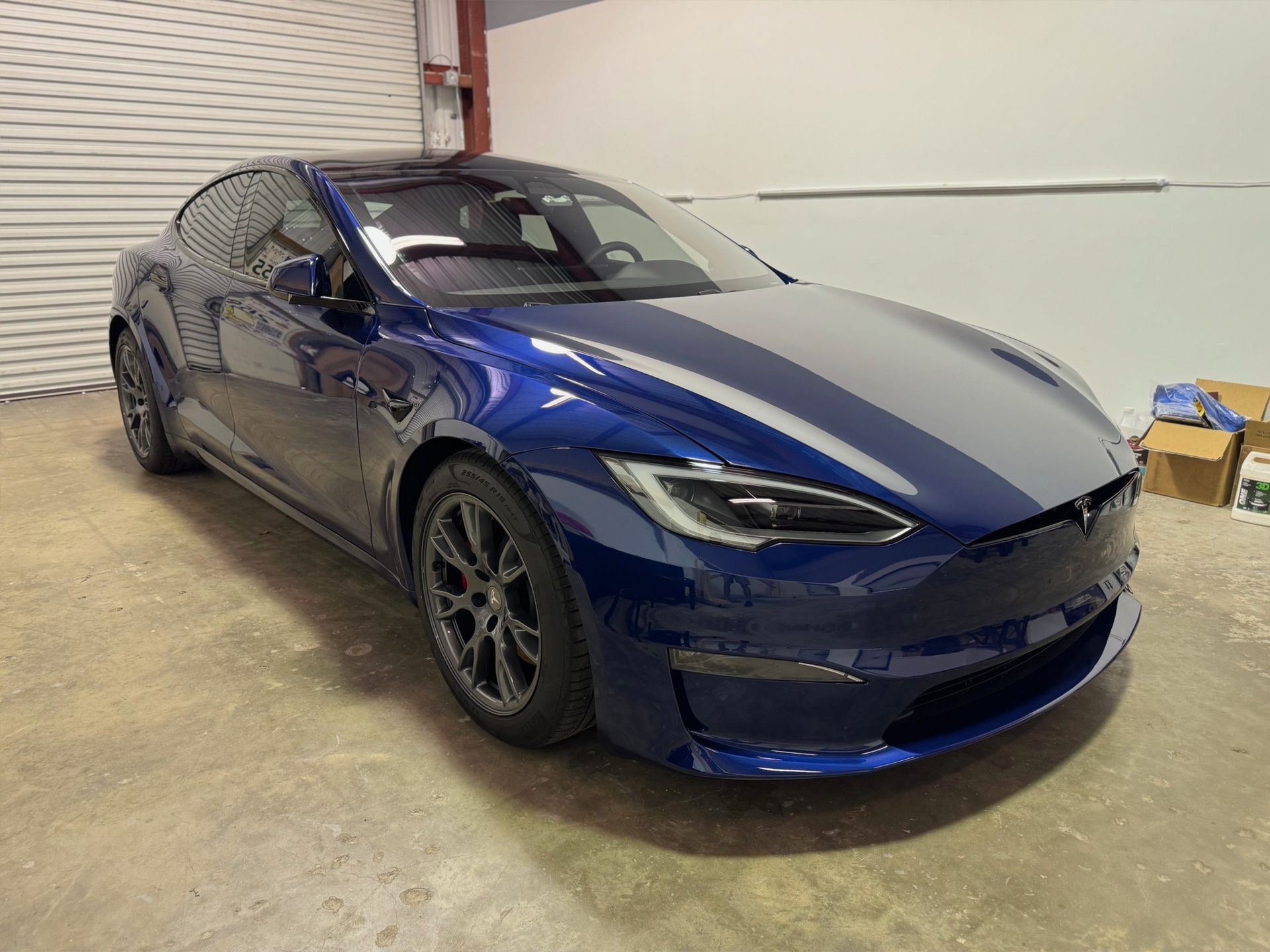 the dashboard of a car has a steering wheel and a radio