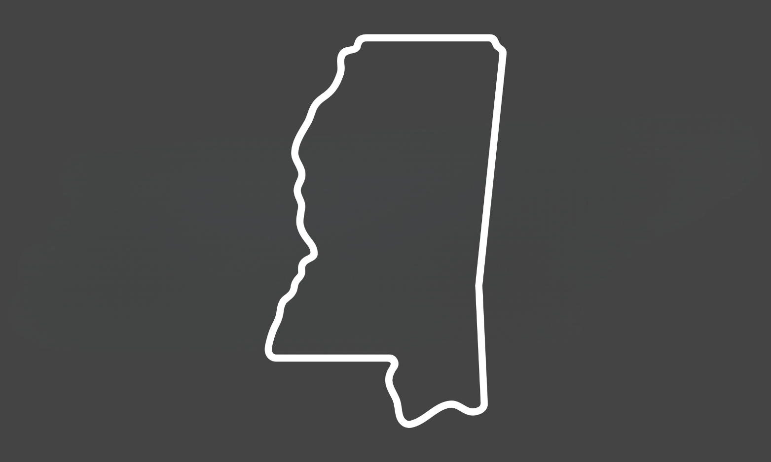 A white line drawing of the state of tennessee with a star in the middle.