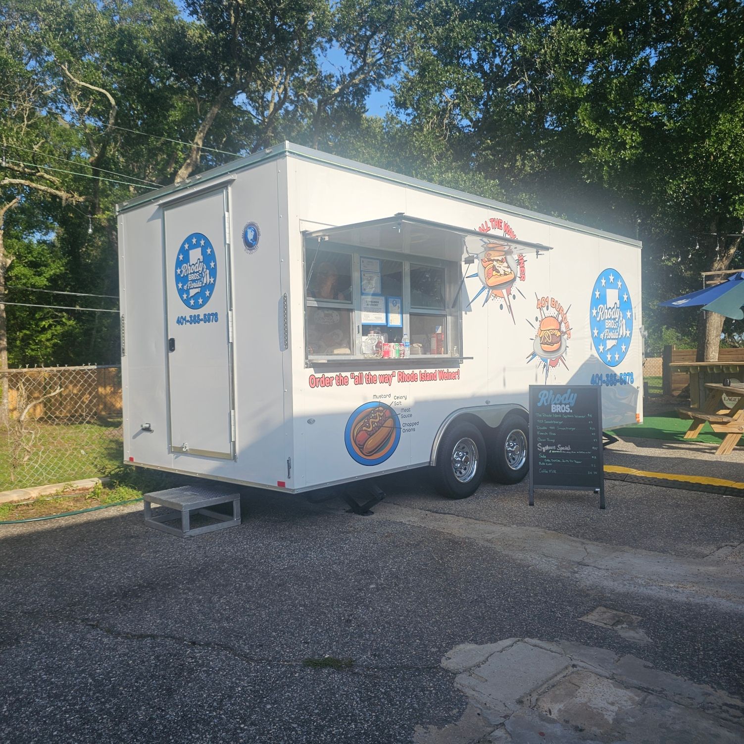 Rhody Bros. of Florida white food truck.