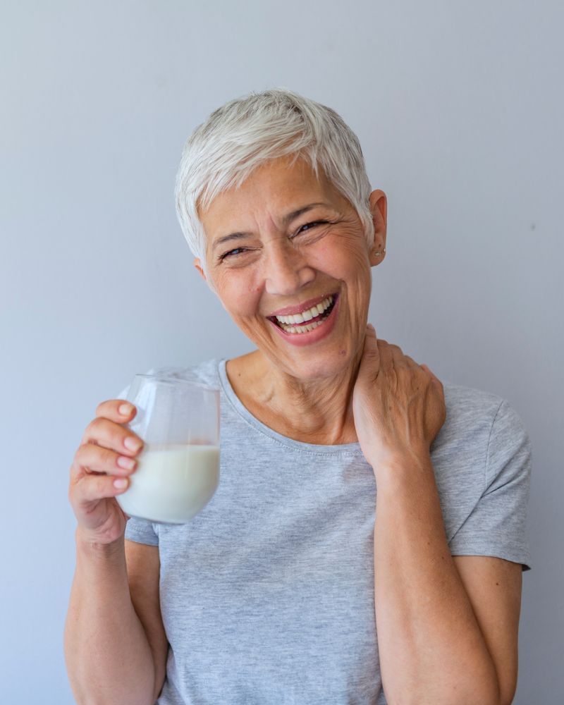 Old lady drinks milk