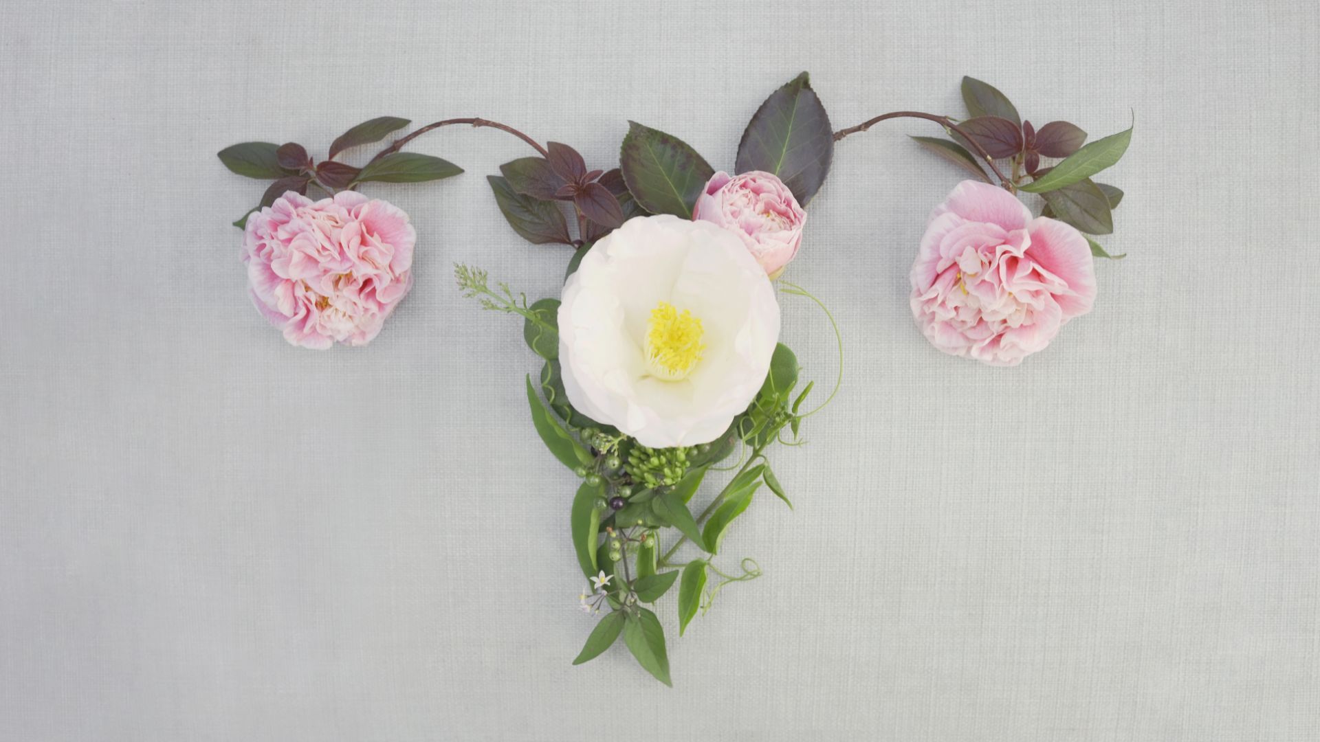 Women uterus made from leaves and flowers