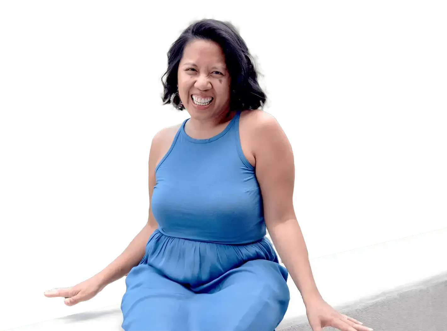 A charismatic photo of Lisa wearing a blue dress.