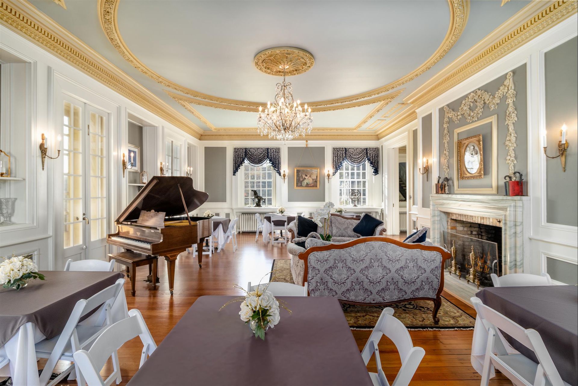 There is a piano in the middle of the room.