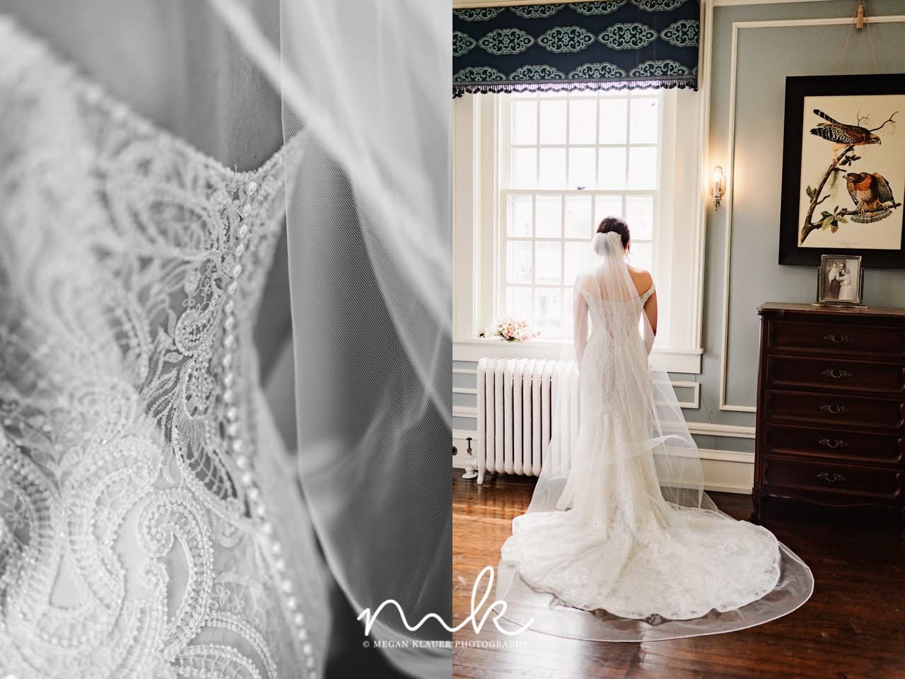 A bride in a wedding dress and veil is standing in front of a window.