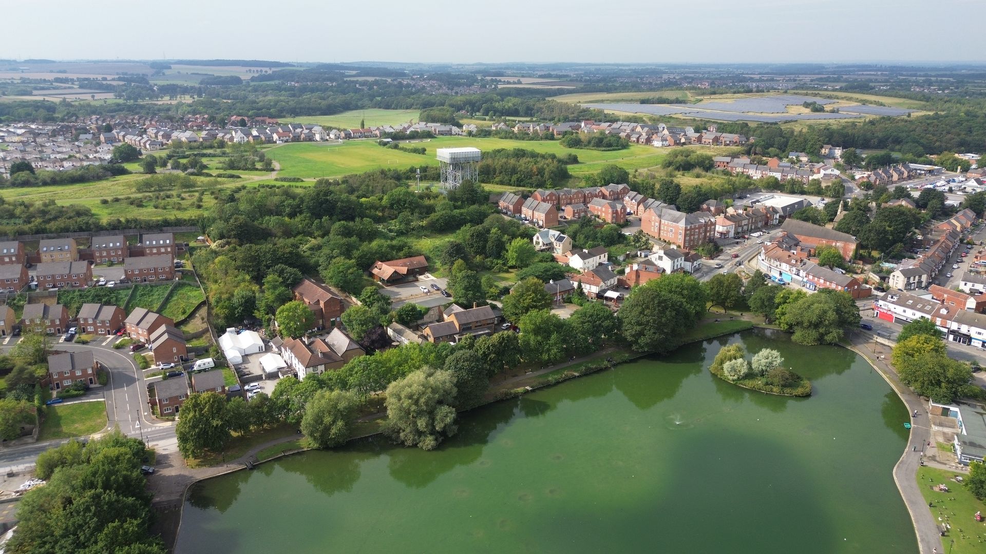 A drone image over Askern in Doncaster featuring houses and the historic Askern lake