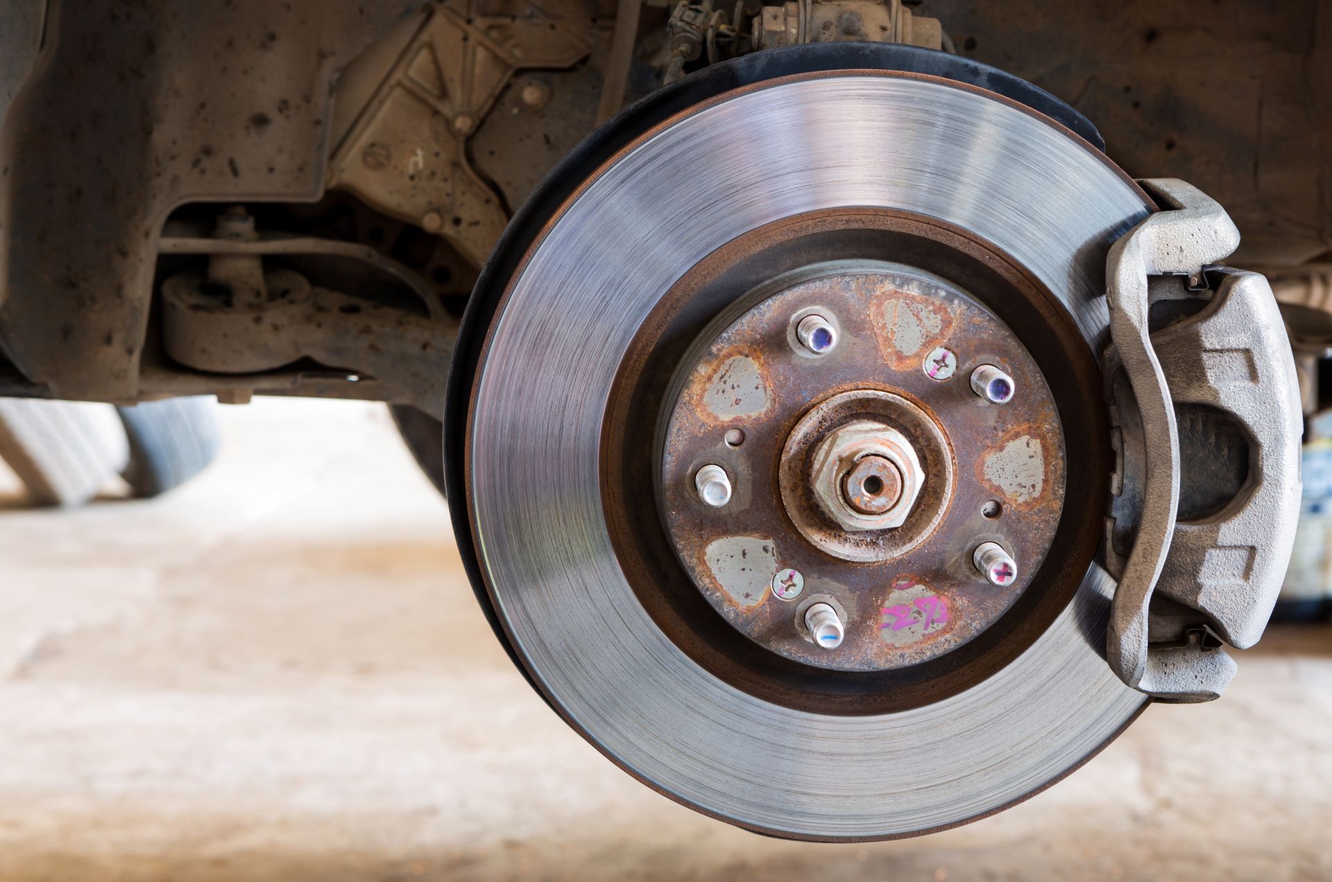 a close up of a brake disc on a car