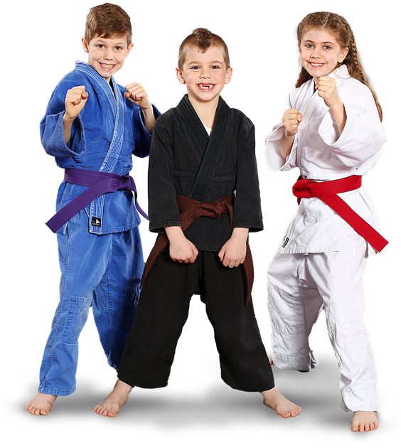 Three children in karate uniforms are standing next to each other