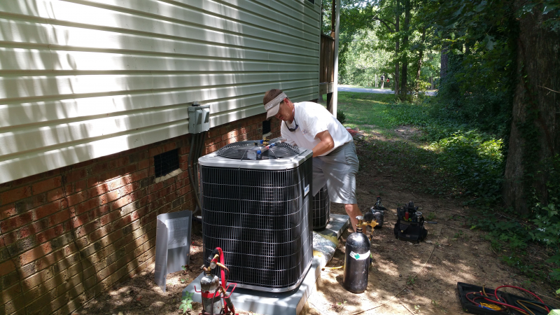 Fixing Air Conditioners Placed On Outside 3 - Rock Hill, SC - Lighthouse Heating & Cooling Specialists Inc