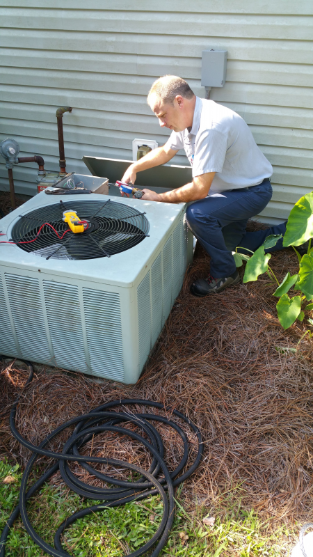 Fixing Air Conditioners 2 - Rock Hill, SC - Lighthouse Heating & Cooling Specialists Inc