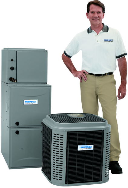 Male Technician Repairing Air Conditioner - Rock Hill, SC - Lighthouse Heating & Cooling Specialists Inc