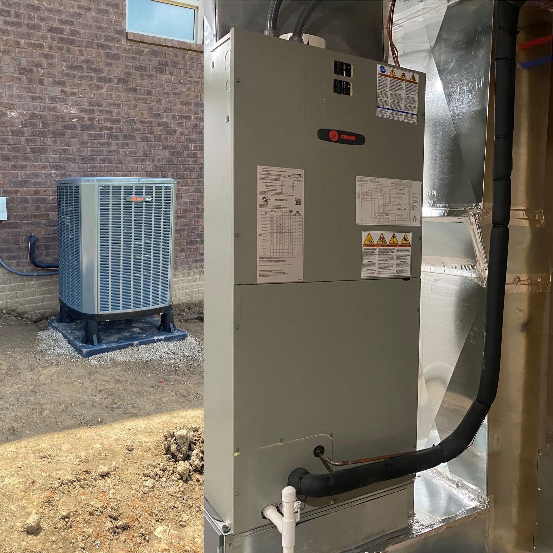 An air conditioner is sitting next to a brick wall.