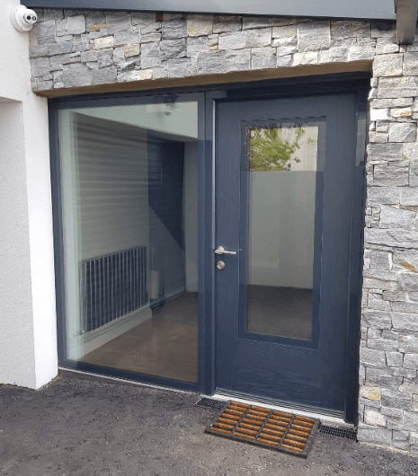 Grey composite door with large matching side light