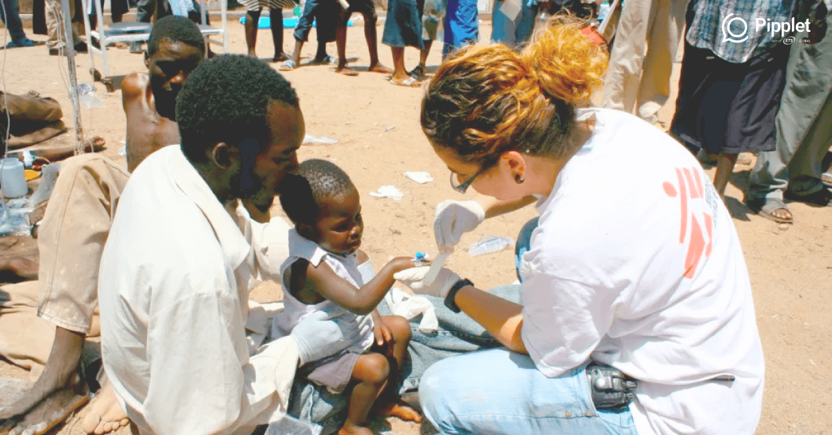 Doctors without borders doctor helping a patient