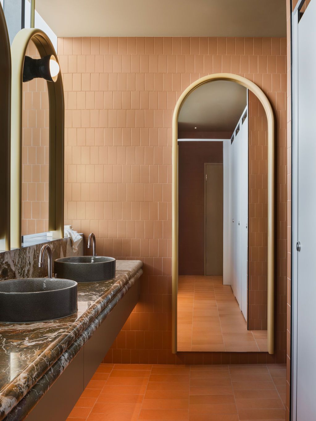 A kitchen with wooden cabinets and a stove top oven