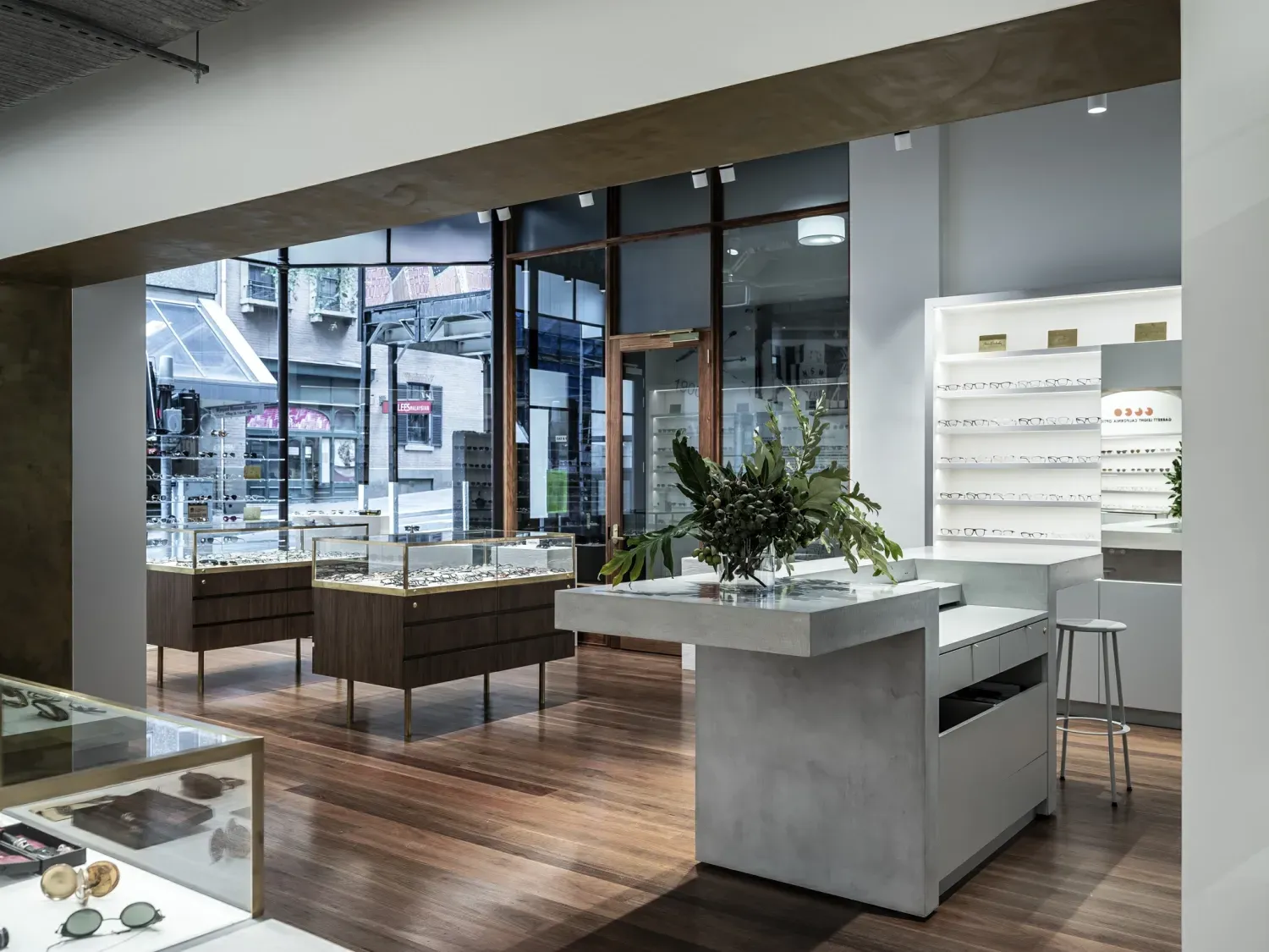 A jewelry store with a lot of display cases and tables.