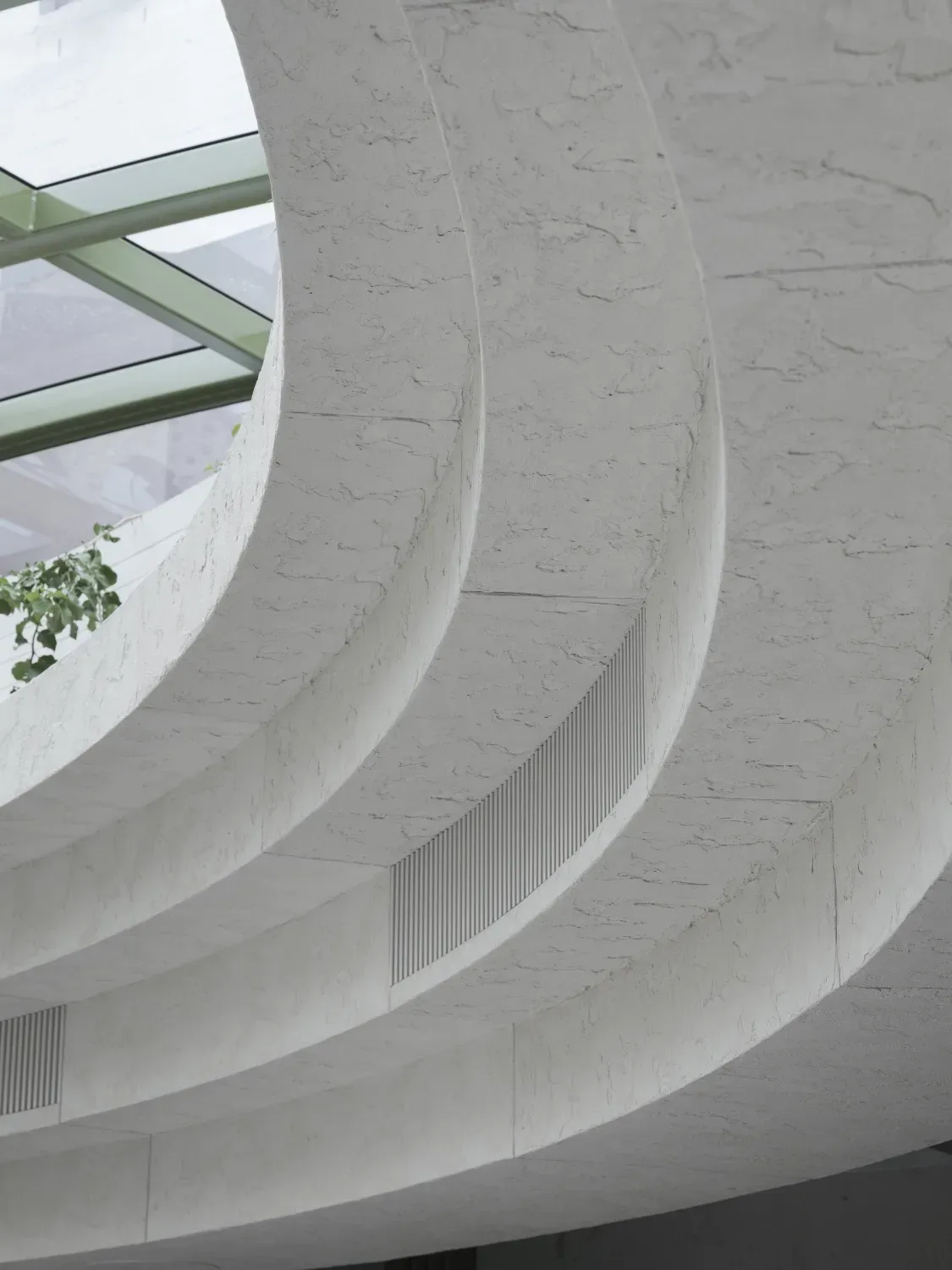 A building with a curved ceiling and a window