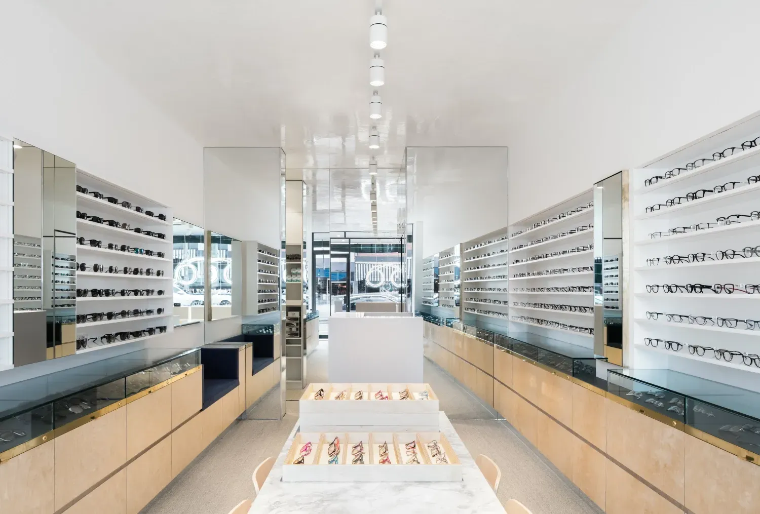 A store filled with lots of glasses on display.