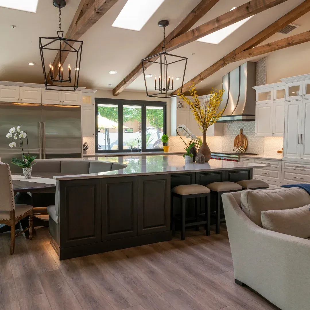 A kitchen with a large island in the middle of it