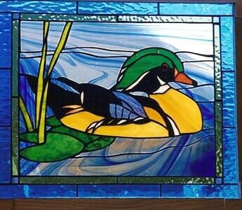 Stained glass Colorful swan — Custom Stained glass services in Sebago, ME