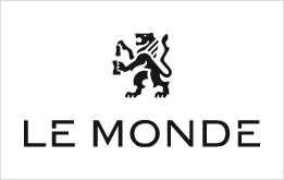 Logo di Le Monde, testo nero con l'emblema di un leone sopra il testo.