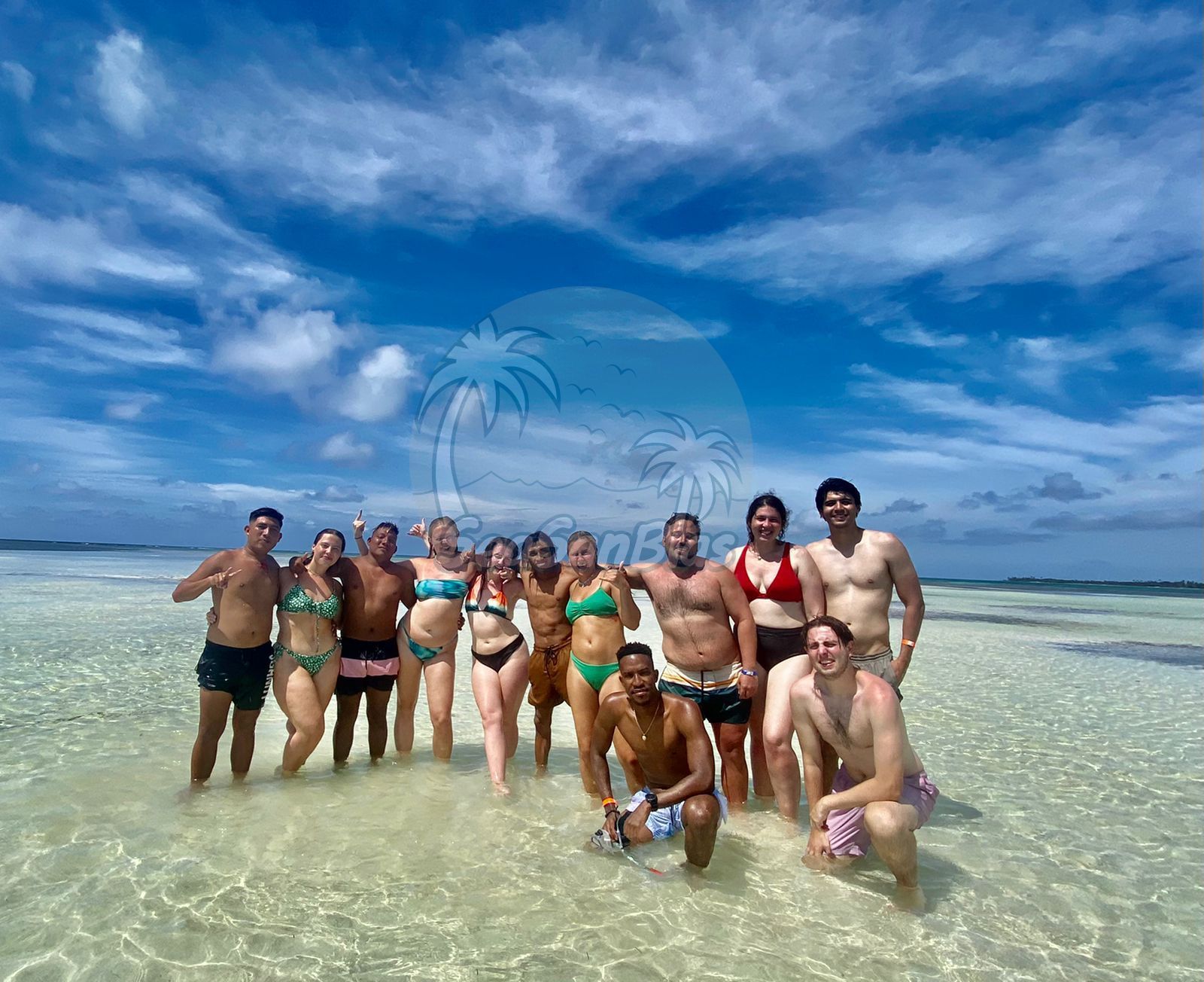 A group of people are posing for a picture in the water. San Blas Islands Guna Yala San Blas Tours