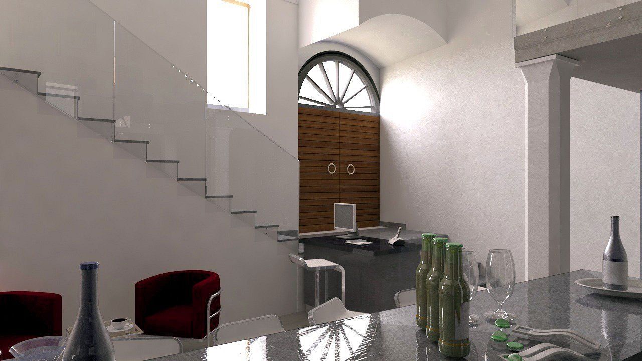 Un soggiorno con scale e un tavolo con bottiglie sopra