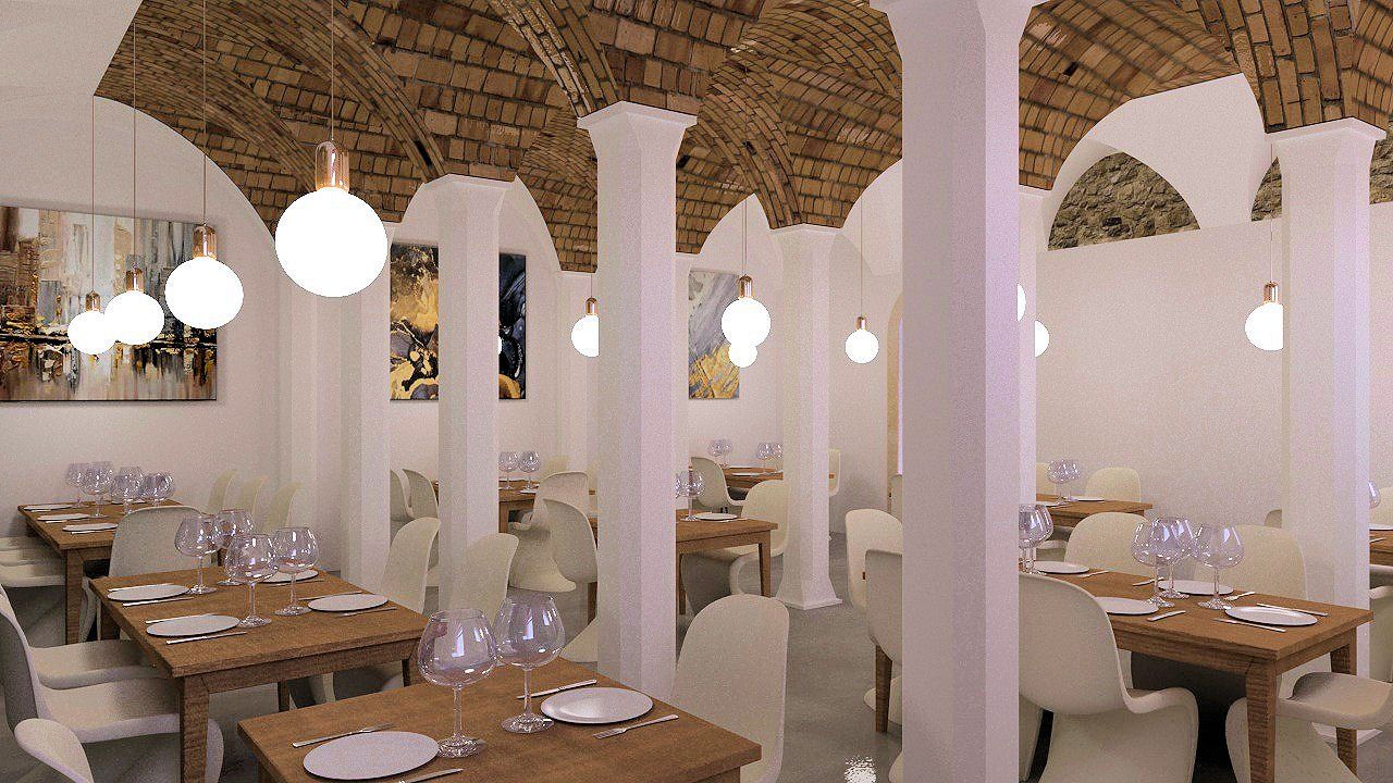 Un ristorante con tavoli e sedie e un soffitto in mattoni