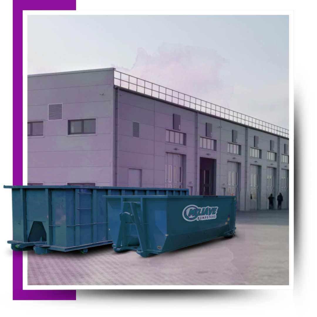 A Mojave Dumpster in front of a commercial building.