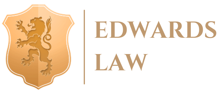 A logo for edwards law with a lion on a shield