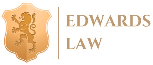 A logo for edwards law with a lion on a shield