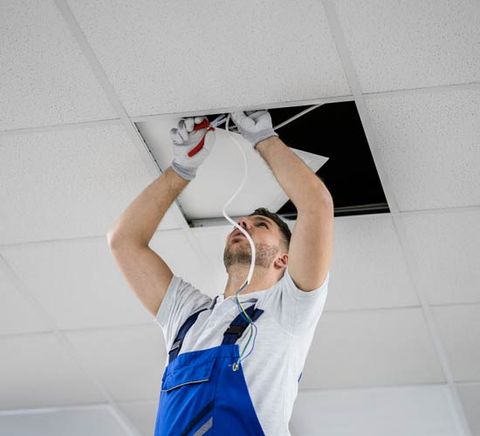 Man Fixing on the Ceiling — DFW, TX — Platinum Service Group