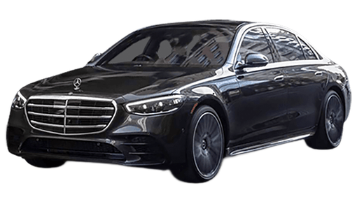 Black Mercedes-Benz sedan angled view, shiny exterior, front grille, black wheels, clear window, daytime.