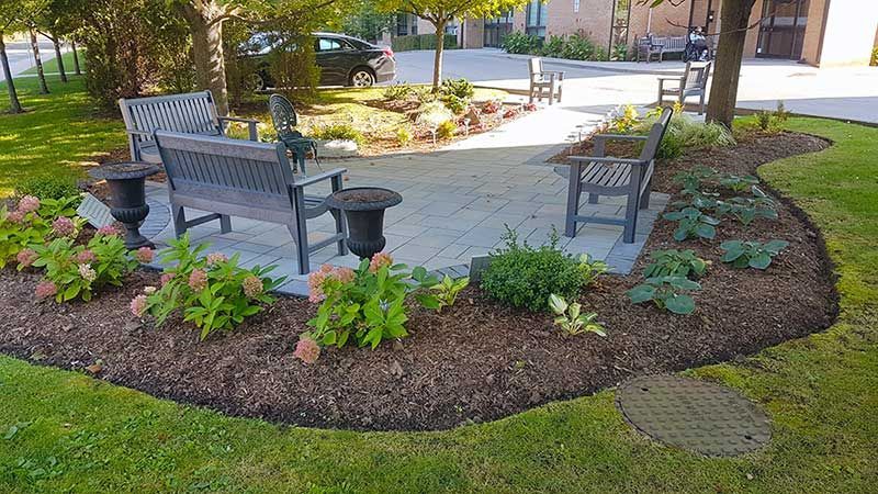 Completed natural stone and interlock patio project