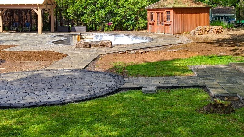 Completed natural stone and interlock patio project