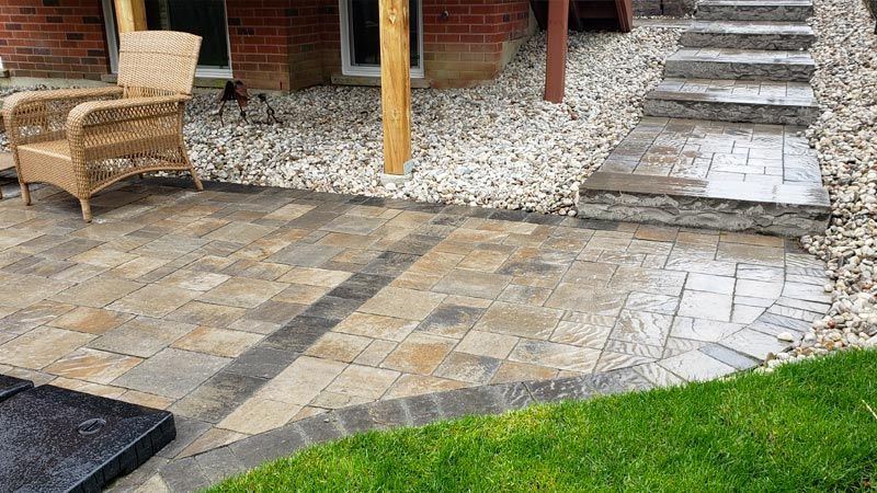 Completed natural stone and interlock patio project