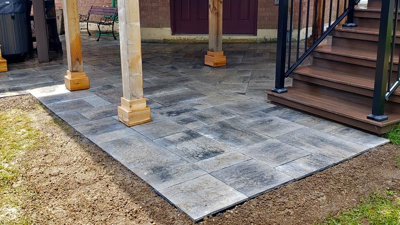 Completed natural stone and interlock patio project