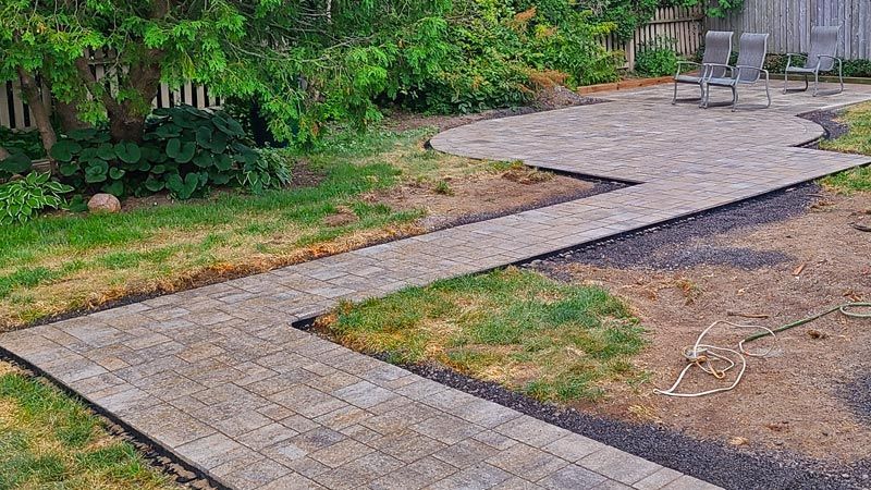 Completed natural stone and interlock patio project